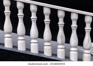 Stone balusters balustrade on dark background - Powered by Shutterstock