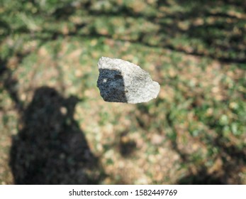 Stone being float on air