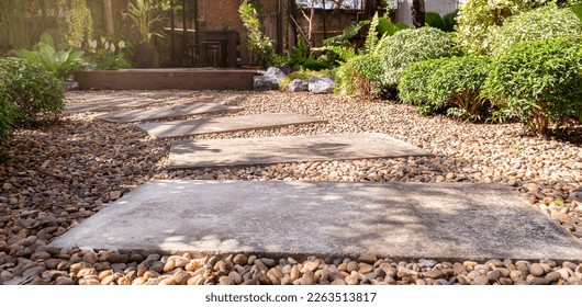 Stone block walk way on gravel stone floor