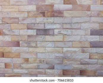 Stone block wall seamless background and pattern texture