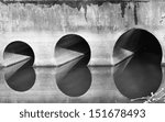 Stone bridge is reflected with the smooth surface of stagnant water.