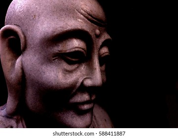 Stone Buddha Head - Shutterstock ID 588411887