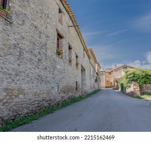 Stone Built Walls And Buildings Of A Typical Spanish Pyrenees Village Street 