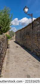 Stone Built Walls And Buildings Of A Typical Spanish Pyrenees Village Street 