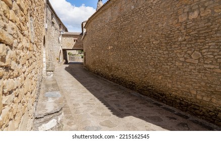 Stone Built Walls And Buildings Of A Typical Spanish Pyrenees Village Street 