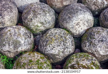 Stone cannonballs found during archaeological excavations in the vicinity of the Novgorod Kremlin - Detinets. Ancient Russia. Veliky Novgorod