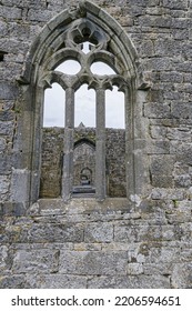 Stone carved window at the ruins Kilmadough Irish church  Ireland 