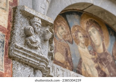 Stone carving on the walls of the Moraca monastery in Montenegro. The Moraca Monastery is a Serbian Orthodox monastery located in the valley of the Moraca River in Kolasin, central Montenegro - Powered by Shutterstock