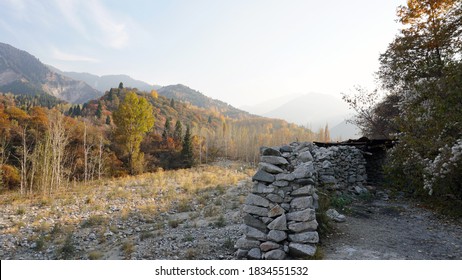 Stone Castle, Near The Walls And Inside. Huge Stone Walls Of The Fortress. Layer Of Cement And Sand. There Are Tools For Construction. View Of The Forest, Mountains From The Fortress. Small Window.