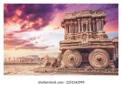 Stone chariot in courtyard of Vittala Temple at sunset purple sky in Hampi, Karnataka, India