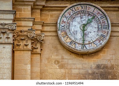 Stone Clockface In Mdina.