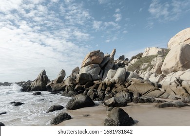 The stone coast of Vietnam. Large boulders on the beach.