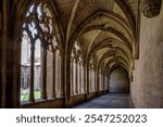 Stone columns and vaulted ceilings of church cloister