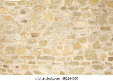 Stone And Concrete Tuscan Wall Background In Italy.