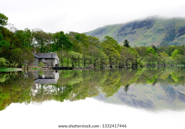 Stone Cottage Reflections On Ulswater Cumbria Stock Photo Edit