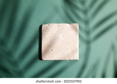 stone display flat lay podium ongreen background and palm shadow. Product promotion Beauty cosmetic showcase. - Shutterstock ID 2023107902