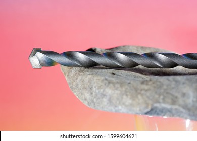 Stone drill with point for drilling in natural stone and concrete photographed in the studio                           
