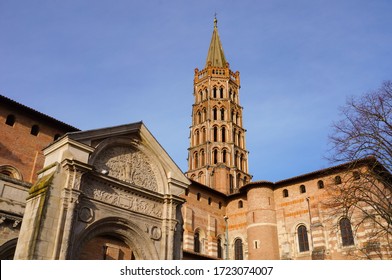 Stone Entry Porch And Brick Bell Tower Of The Basilica Of Saint-Sernin In Toulouse, France, A Medieval UNESCO World Heritage Site And The Biggest Romanesque Church In Europe, On Saint James Way