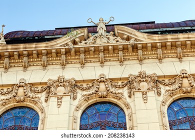 stone facade on classical building with ornaments and sculptures