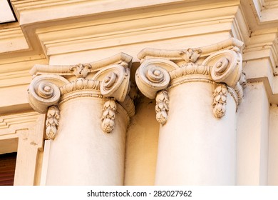 stone facade on classical building with ornaments and sculptures