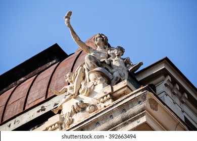 stone facade on classical building with ornaments and sculptures