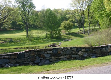 stone fence on golf green