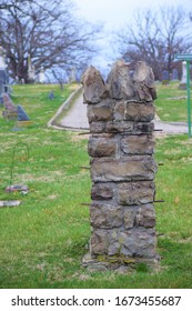 Stone Fence Post In A Cemetery