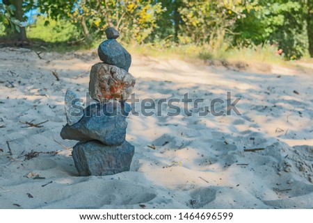 Stone figure on the beach