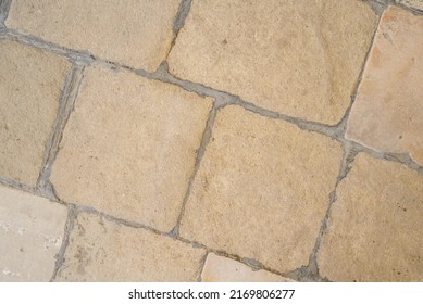 Stone Floor Background. Stone Wall Texture. The Texture Of The Old Stone Wall. Top View Of The Light Stone Floor.