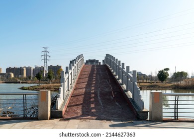 Stone Footbridge In An Asian Garden