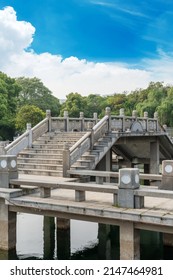 Stone Footbridge In An Asian Garden