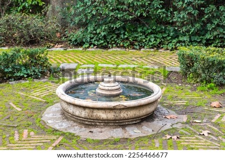 Stone fountain at Principe de Anglona Garden (Anglona's Prince Garden). Madrid, Spain.