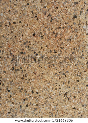 Stone grain and sand mixed in cement floor. Background image
