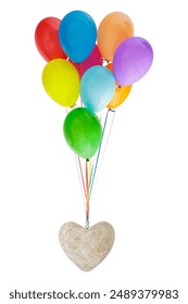 Stone heart hanging on a set of colorful balloons isolated on a white background