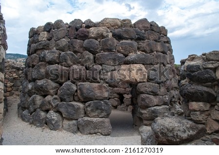 Stone historic buildings named Nuraghi on the island of Sardinia in Italy. Stock photo © 