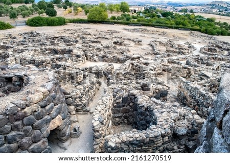 Stone historic buildings named Nuraghi on the island of Sardinia in Italy. Stock photo © 