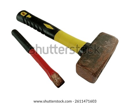 A stone mason hammer and chisel isolated