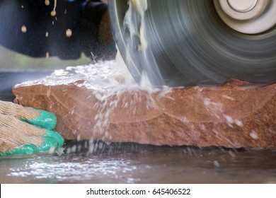 Stone Masonry Concept, Close Up Of Cutting Sandstone By Industrial Circular Saw Blades