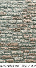 Stone masonry texture wall abstract background close up texture. Natural gray and blue rock pattern background detailed backdrop with irregular shapes. Vertical photograph high resolution