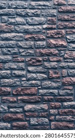 Stone masonry texture wall abstract background close up texture. Natural gray and blue rock pattern background detailed backdrop with irregular shapes. Vertical photograph high resolution