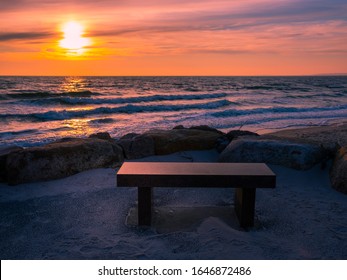 Stone Memorial Bench Near Beach At Sunset