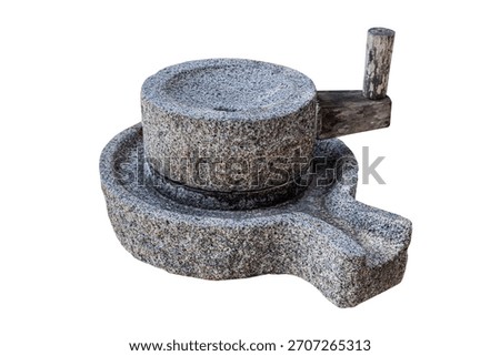 Stone mill, an ancient tool for grinding grain.
Antique concept, collectible, display item.
Single image on a white background. This image has clipping lines.