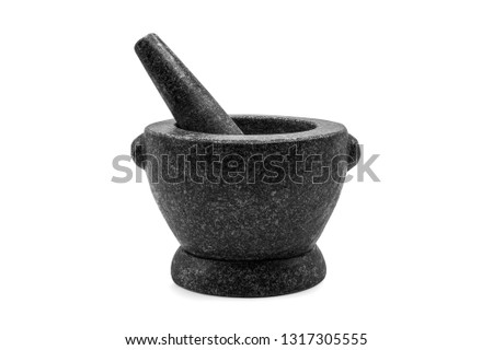 Stone Mortar & Pestle isolated on white background with clipping path.Stone mortar is an important tool in making chili curry in Thai food.