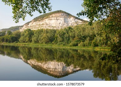 stone mountain in the reflection of the river
