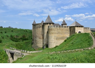 stone old fortress Khotyn on the background of a green field - Shutterstock ID 1119056159