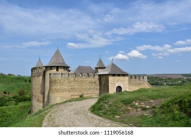 stone old fortress Khotyn on the background of a green field - Shutterstock ID 1119056168