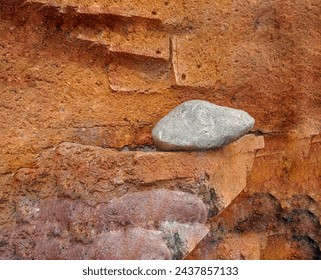 stone is on wall on brown interior
