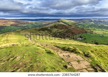The stone path leading from Mam Tor, with a view along the pathway Great Ridge to Back Tor and Lose Hill, in the Peak District National Park, Derbyshire.
