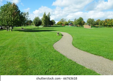 Stone Pathway in a Lush Green Park