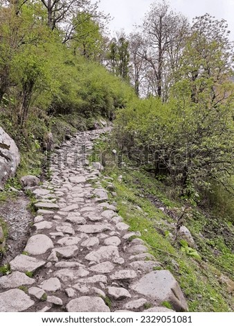 Stone pathway in mountains of Sankari Range in Har Ki Dun Trek
